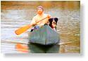 Leashed pets OK! A man and his dog, out on the Withlacoochee River having fun.