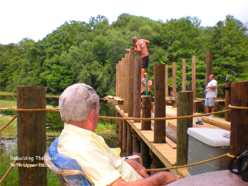 Adding an uppler level to our fishing dock. Now you can see better, fish further out, and be shaded below on those hot summer days.
